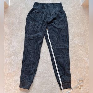 Athleta salutation textured jogger. Black on black print. Size M